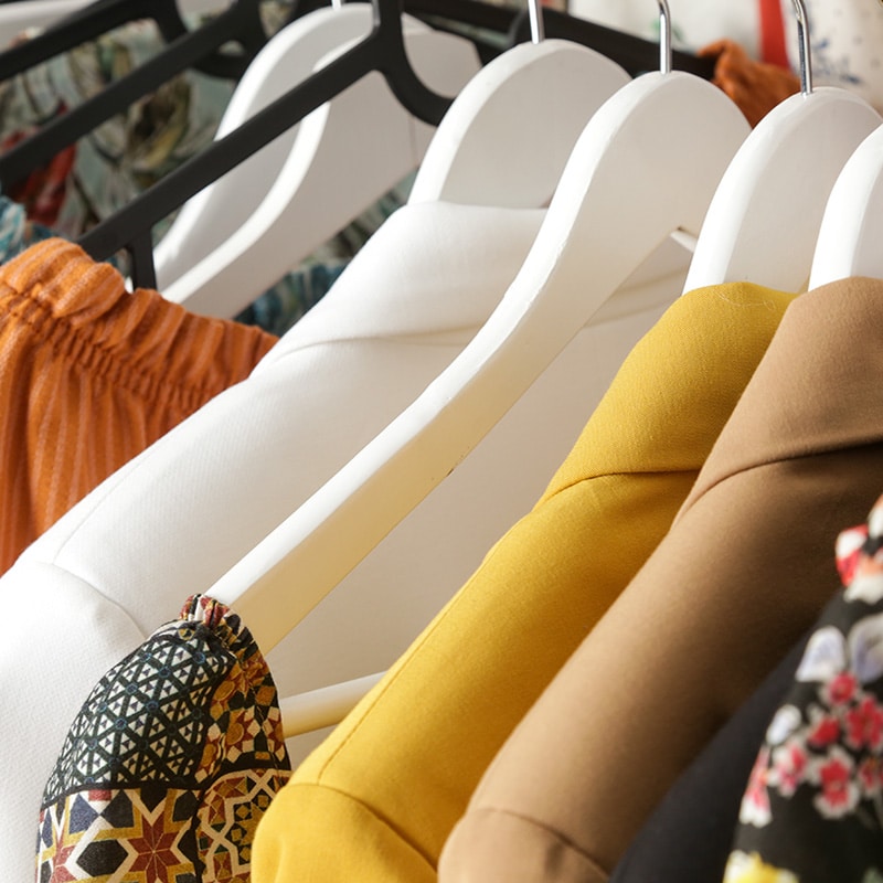 Rack of hanging clothes at St. Joe's Thrift Store